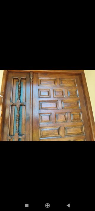 Puerta exterior madera maciza castellana