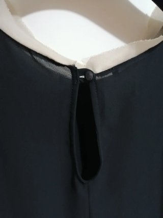 Camicia elegante nera con dettagli beige