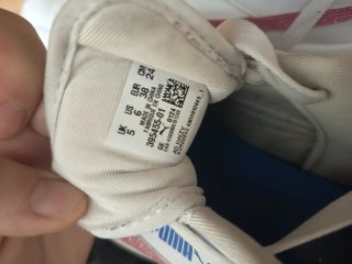 Zapatillas Puma Blancas con Detalles Rosas