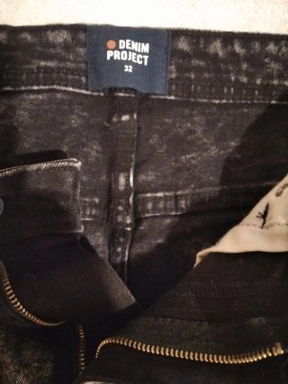 Pantalón corto vaquero desgastado