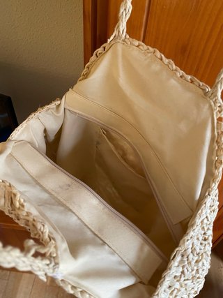 Bolso de rafia redondo con flecos