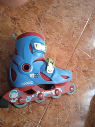 Patines Oxelo azules y rojos de talla 34-36
