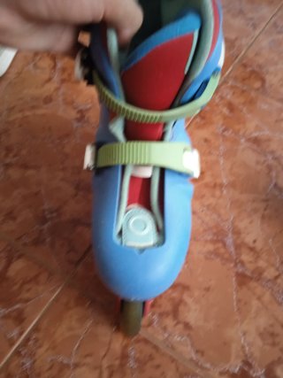 Patines Oxelo azules y rojos de talla 34-36