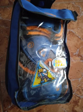 Patines Oxelo talla 34-36 y protecciónes