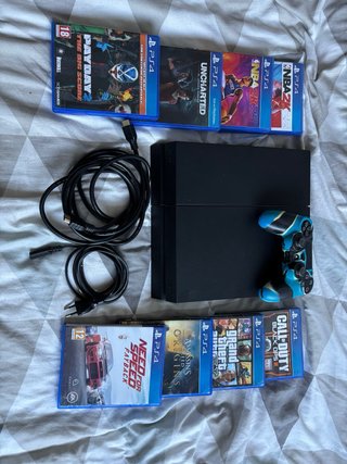 PS4 500GB + Mando + 8 Juegos y Cables