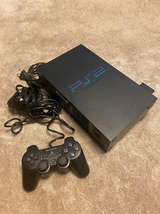 Consola PS2 con mando y 5 juegos