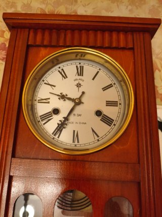 Reloj de Pared Polarís Madera y Cristal.