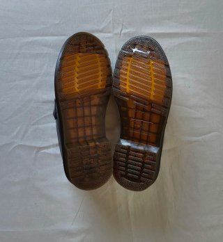 Mocasines Dr. Martens negros con flecos