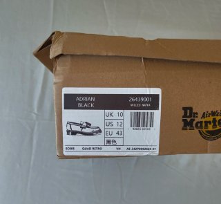 Mocasines Dr. Martens negros con flecos
