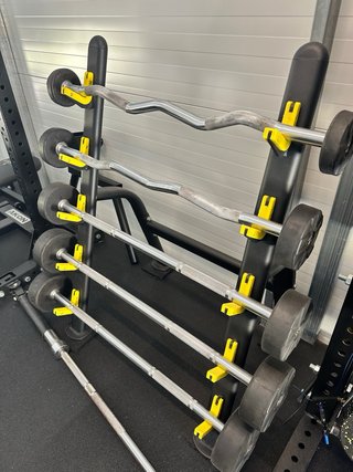 Rack de barras para gimnasio