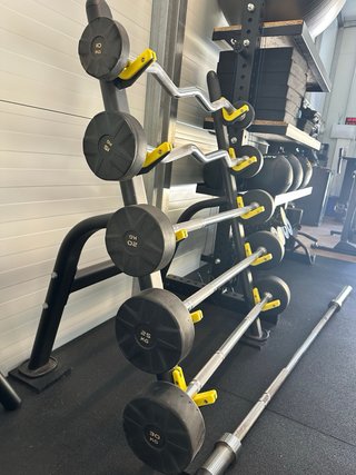 Rack de barras para gimnasio