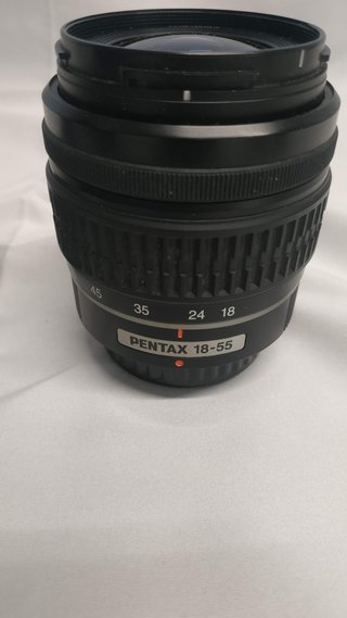 Pentax K20D (7600s) + pentax 18-55 + tamron 70-300