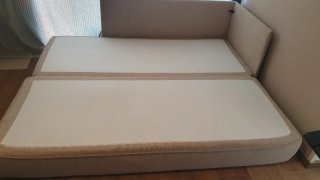 Sofá cama beige de tela