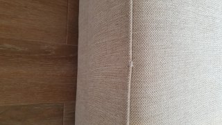 Sofá cama beige de tela