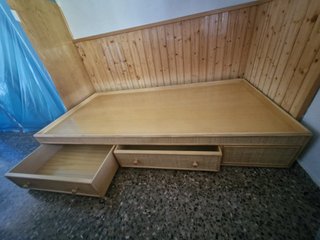Cama nido de bambú con cajones.