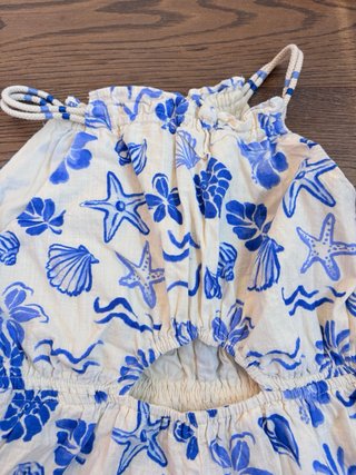 Mono Zara estampado conchas y flores