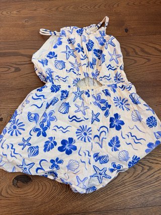 Mono Zara estampado conchas y flores