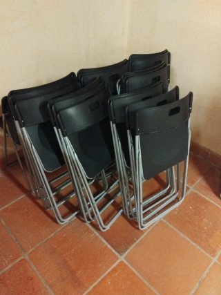 10 Sedie pieghevoli nere (confezione). Senza marchio