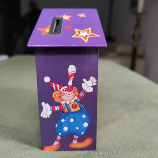Hucha musical de colección con marioneta
