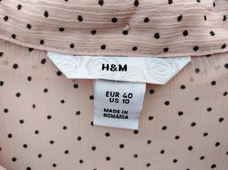 Bowtie shirt H&M de color rosa pálido