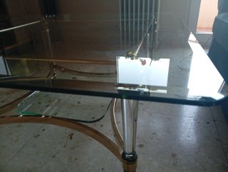 Mesa de centro cristal y metal dorado