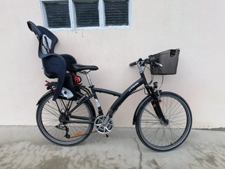 Bicicleta BTWIN con sillita y cesta