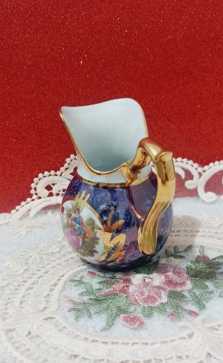 Jarra de porcelana Limoges azul y dorada