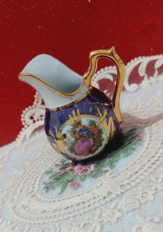 Jarra de porcelana Limoges azul y dorada