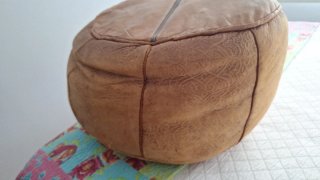 Puff rotondo in pelle