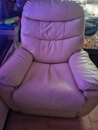 Divano in pelle beige reclinabile con massaggio