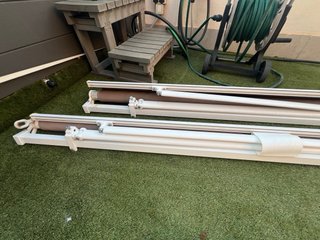 Toldo exterior enrollable topo