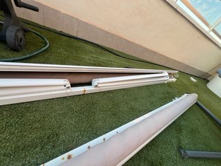Toldo exterior enrollable topo