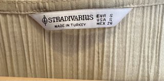 Blusa Stradivarius plisada cruzada