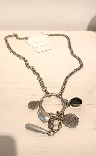 Colgante nuevo con varios dijes