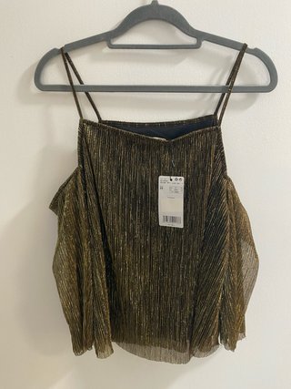 Blusa fiesta dorada con brillos