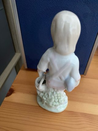 Figuras porcelana antiguas niños pájaro.