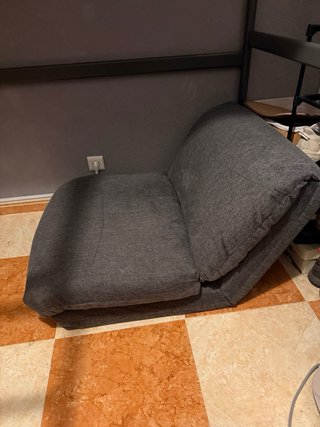 Sillón cama JYSK gris tela