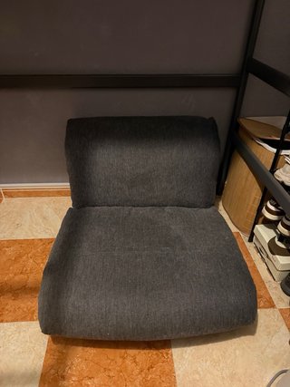 Sillón cama JYSK gris tela