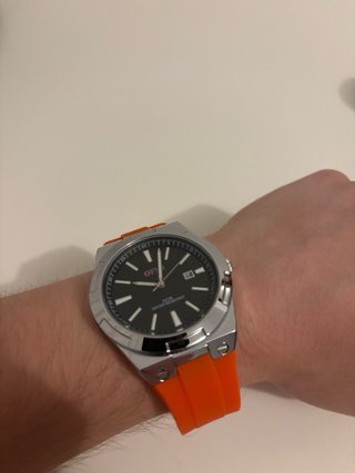 Reloj plateado y naranja NUEVO
