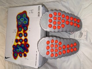 Chanclas Nike grises y naranjas