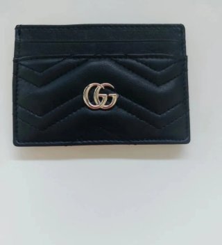 Tarjeteros Gucci y Goyard