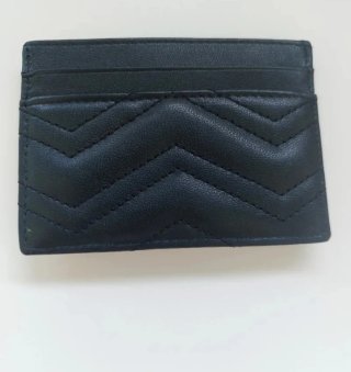 Tarjeteros Gucci y Goyard