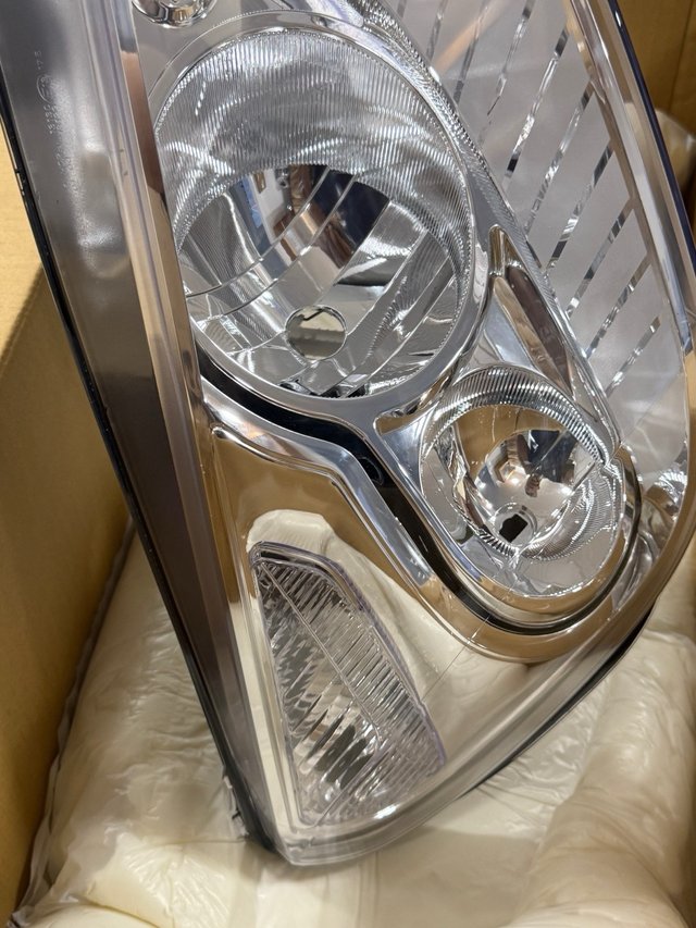 Faro Derecho HELLA 1ZS 009 250-801 para Ford Galax