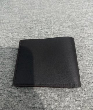 Portafoglio uomo nero con dettagli argento