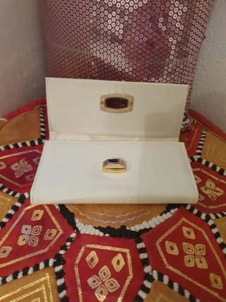 Monederos blancos y vaqueros