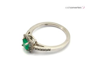 sortija oro 18k con piedra con diamante,esmeralda