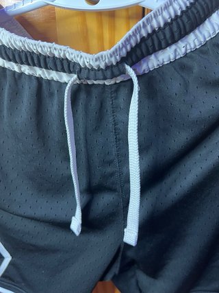 Pantalón Jordan negro y blanco en talla XS.