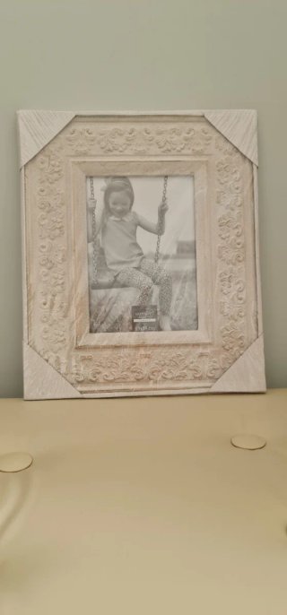 Cornici in legno con decorazioni