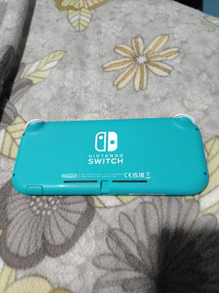 Nintendo Switch Lite + Juego y Accesorios