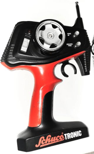 COCHE RC SCHUCO TRONIC CON MANDO Y CARGADOR